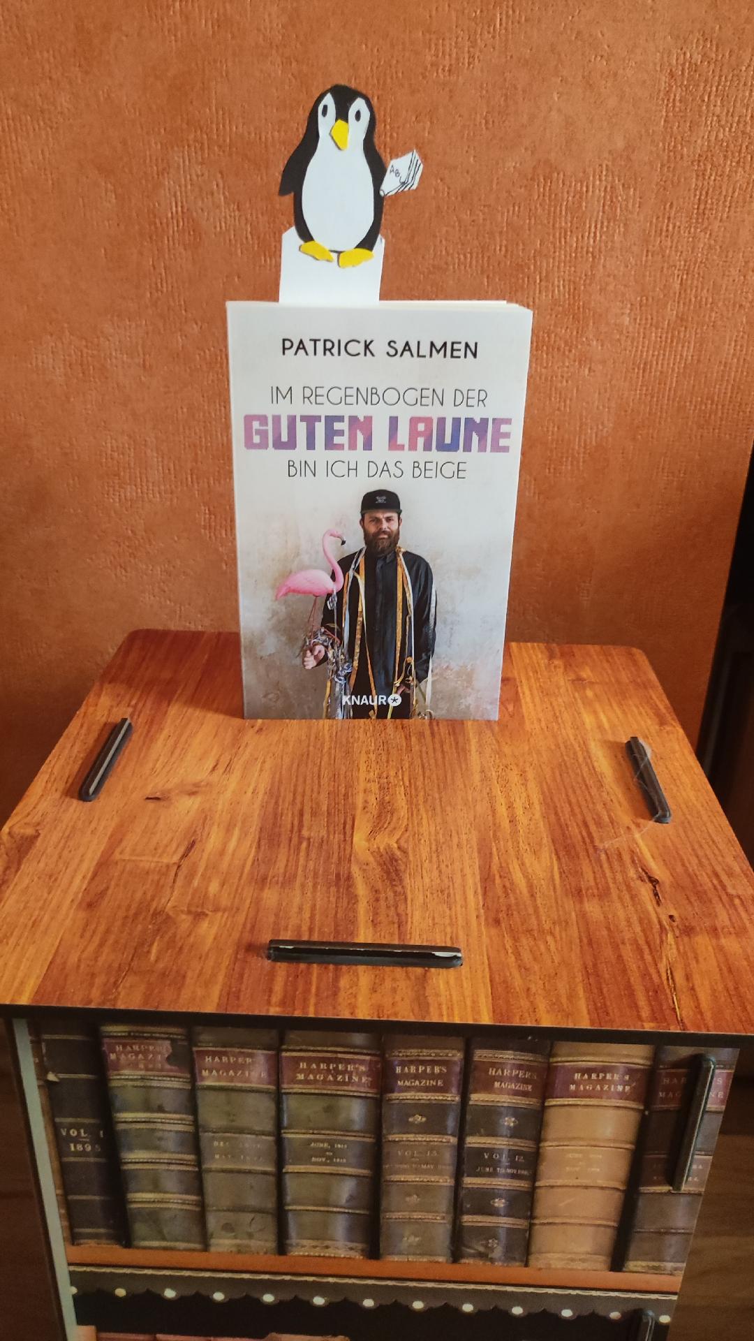 Salmen, Patrick: Im Regenbogen der guten Laune bin ich das beige – Rezension